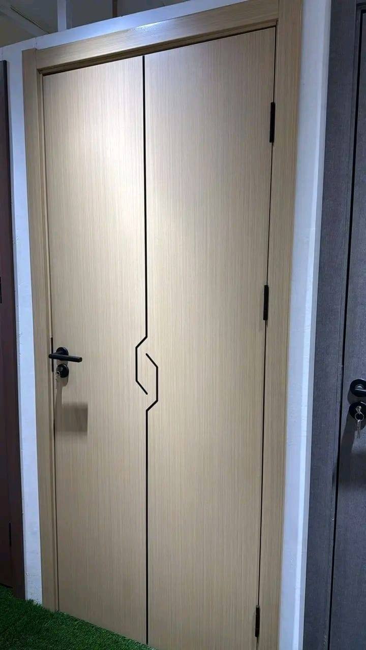 Grey woodgrain flush door with zigzag groove detail