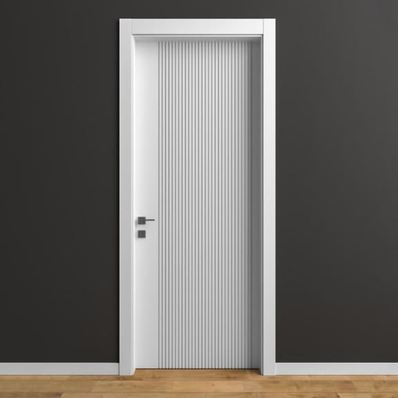 White vertical-groove flush door against a dark wall