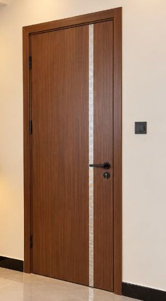 Walnut flush door with a pearl inlay strip